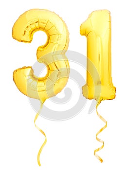 Golden number 31 thirty one made of inflatable balloon with ribbon on white