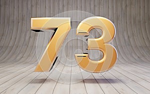 Golden number 73 on wooden floor