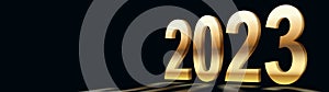 Golden numbers 2023 on a black background. Festive contrast banner for the New Year.