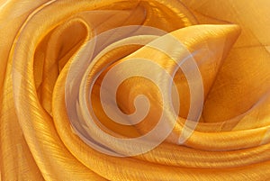 Golden organza fabric wavy texture