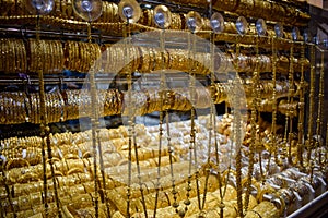 Golden ornaments kept on display at a shop