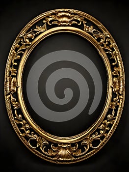 golden oval vintage frame isolated on black background with clipping paths. Gold frame on a wooden background. Gold oval frame on