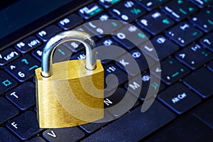 Golden Padlock on Keyboard Cyber Security Concept With Copy Space