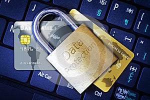 Padlock on Top of Credit Cards on Keyboard Cyber Security Concept