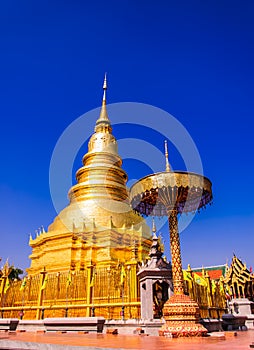 Golden Pagoda in blue sky.