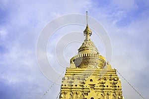 Golden Pagoda with blue sky in Sangklaburi, Thailand.