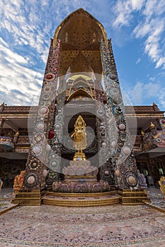 The golden pagoda is design from ceramics colorful and beautiful ,is public temple place