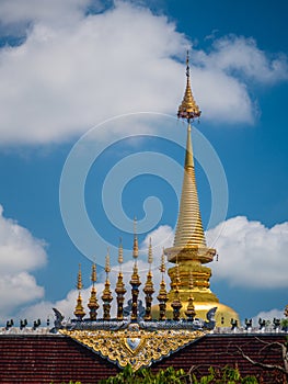 Golden pagoda and gable Apex of Thai Temple at Wat Pa Dara Phirom, Chiang Mai Province