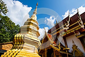 Golden pagoda in Phrathat Chom Sin temple