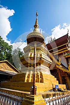 Golden pagoda in Phrathat Chom Sin temple