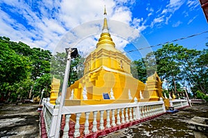 Golden Pagoda of Wat Phrathat Phu Khwang at Phu Kam Yao District