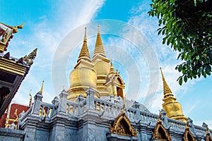 Golden pagoda at Wat Tri Thotsathep temple in Bangkok, Thailand