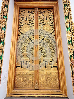 The golden painting in the temple in Thailand.