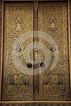 Golden painting on the ubosot door