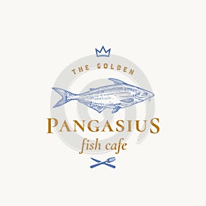 Golden Pangasius Abstract Vector Sign, Symbol or Logo Template. Hand Drawn Basa Fish with Classy Retro Typography. Crown photo