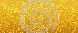 Golden particles shining stars dust bokeh glitter awards dust abstract background.