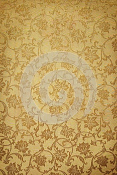 Golden pattern on wallpaper