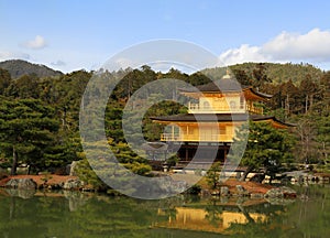 Golden pavilion or castle and lake foreground with copy space. This place call Kinkakuji Temple, Kyoto Japan.