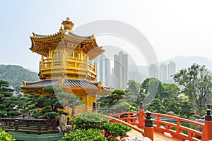 The Golden pavilion and gold bridge in Nan Lian Garden near Chi Lin Nunnery. A public chinese classical park in Diamond Hill,
