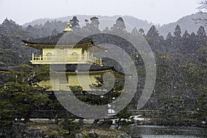 Golden pavilion in Kyoto Japan during a snow storm