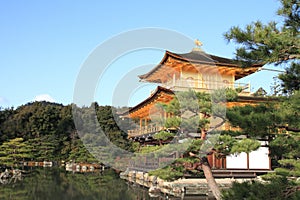 Golden pavilion and pond of Kinkaku ji in Kyoto