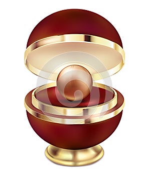 A golden pearl jewelry in a gift red box. A large gold golden pearl in a beautiful red gift round package with a gold design on a