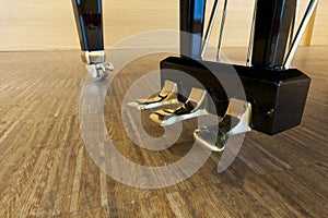 Golden pedals of a grand piano photo