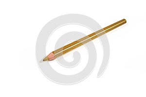 Golden pencil on a white background