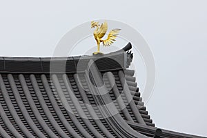 Golden Phoenix statue on the roof of Byodoin Temple in Uji,Kyoto,Japan