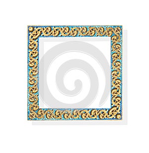 Golden picture frame decorative on blue glass  with engraving floral patterns isolated on white background , clipping path