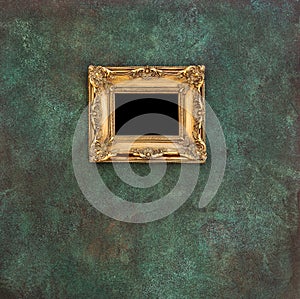 Golden picture frame grungy wall background