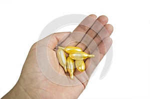 Golden Pills in Hand