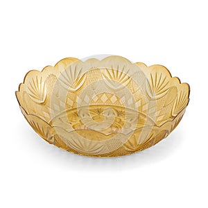 Golden plastic plate isolated over white background