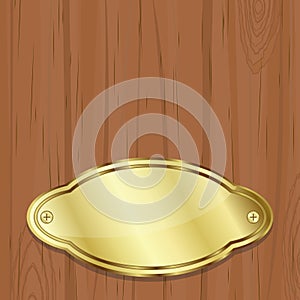 Golden plate over wood