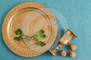 Golden plate for Seder Pesach. Jewish Passover holiday
