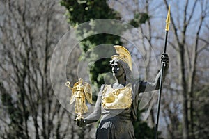 Golden plated statue of Athena/Minerva holding Nike