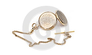Golden pocket with chain watch isolated on a white background