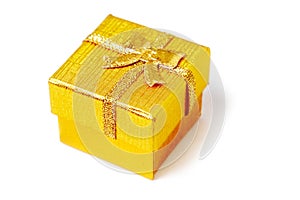 Golden present box isolated