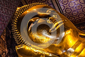 Golden reclining buddha face