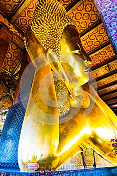 Golden reclining buddha of Wat Pho temple, Bangkok Thailand