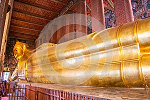 Golden Reclining Buddha in Wat Phra Chetuphon (Wat Pho) Buddhist temple Bangkok, Thailand