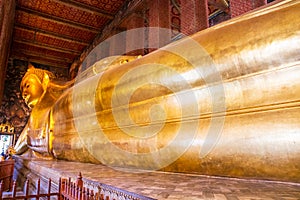 Golden Reclining Buddha in Wat Phra Chetuphon (Wat Pho) Buddhist temple Bangkok, Thailand