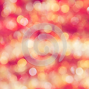 Golden and red abstract bokeh glitter background