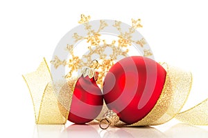 Golden and red christmas ornaments on white background. Merry christmas card.