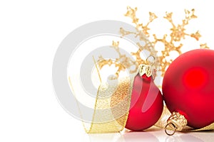 Golden and red christmas ornaments on white background. Merry christmas card.
