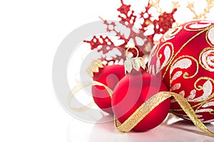 Golden and red christmas ornaments on white background. Merry christmas card.