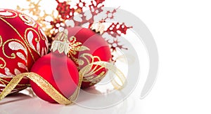 Golden and red christmas ornaments on white background. Merry christmas card.