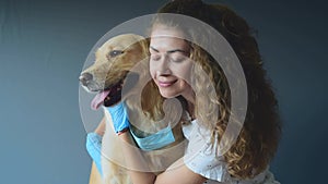 Golden retriever dog wearing medical mask for protection from virus isolated. medicine, pets and pandemic concept. Pet care animal