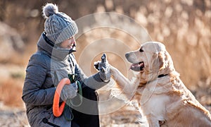 Golden retriever dog with woman