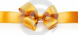 Golden ribbon bow with long straight ribbon for banner, isolated on white background with copy space